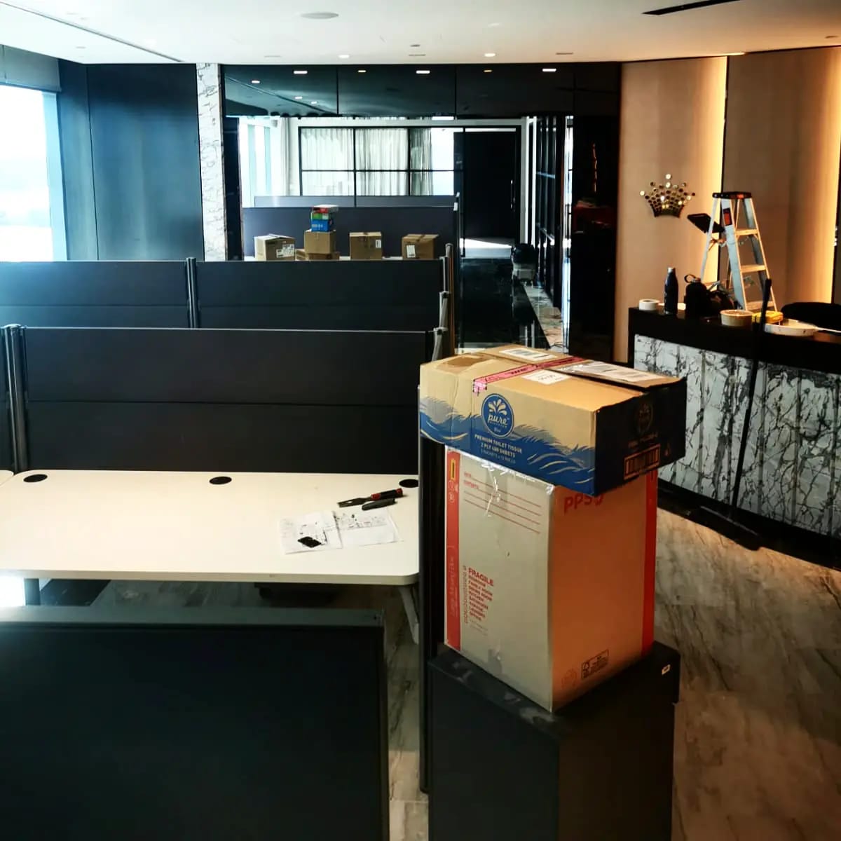 Atlantis Removals team relocating office furniture in Newcastle