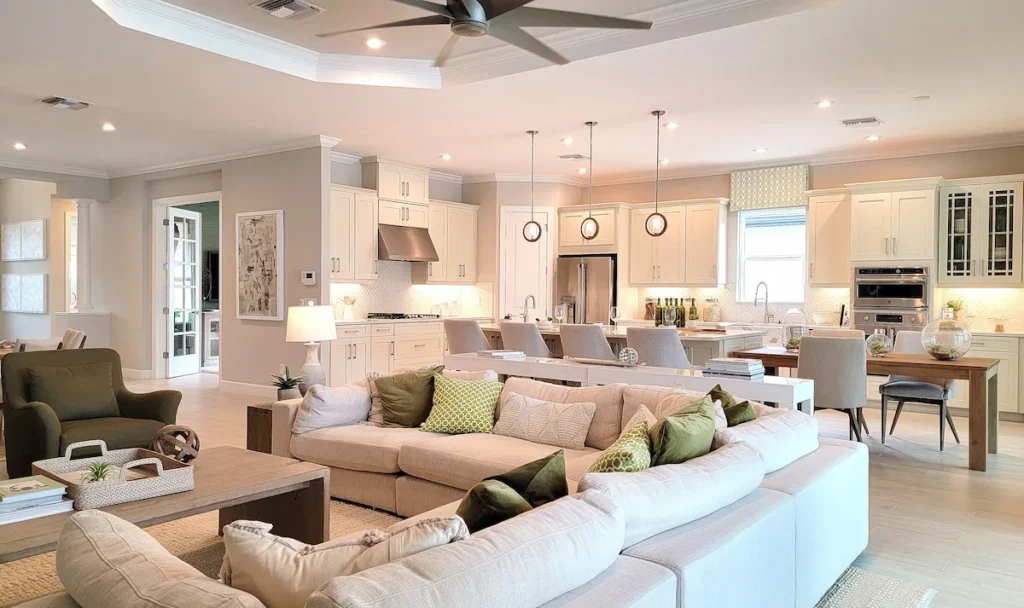 A spacious, beautifully furnished open-plan living room and kitchen, representing the large 3+ bedroom home moving services provided by Atlantis Removals in Newcastle.