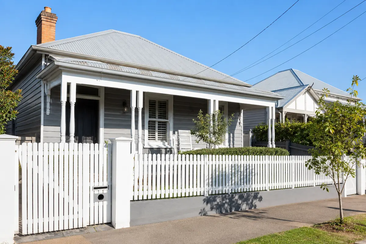 Beautiful classic weatherboard home with a white picket fence in Newcastle, representing the local residential moves completed by the highly reviewed Atlantis Removals team.